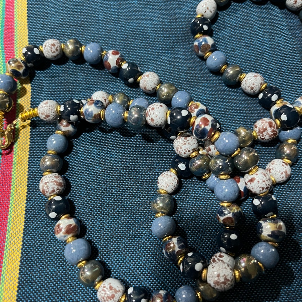 Elegant Beaded Necklace with Blue and Gold Accents